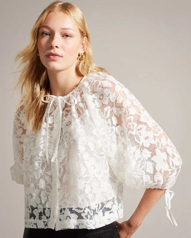 Gillou Puff Sleeve Blouse With Tie Detail White Asymmetric Hem Blouse