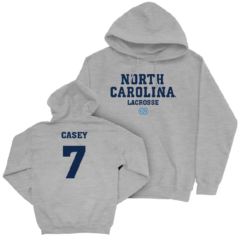 UNC Women's Lacrosse Sport Grey Staple Hoodie - Reilly Casey Graphic Hoodie Design Print UNC Women's Lacrosse Sport Grey Staple Hoodie - Reilly Casey Graphic Hoodie Design Print