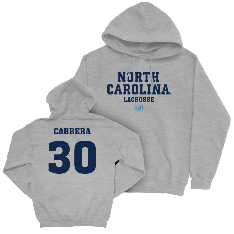 UNC Women's Lacrosse Sport Grey Staple Hoodie - Ella Cabrera Hoodie with Logo Branding Identity UNC Women's Lacrosse Sport Grey Staple Hoodie - Ella Cabrera Hoodie with Logo Branding Identity